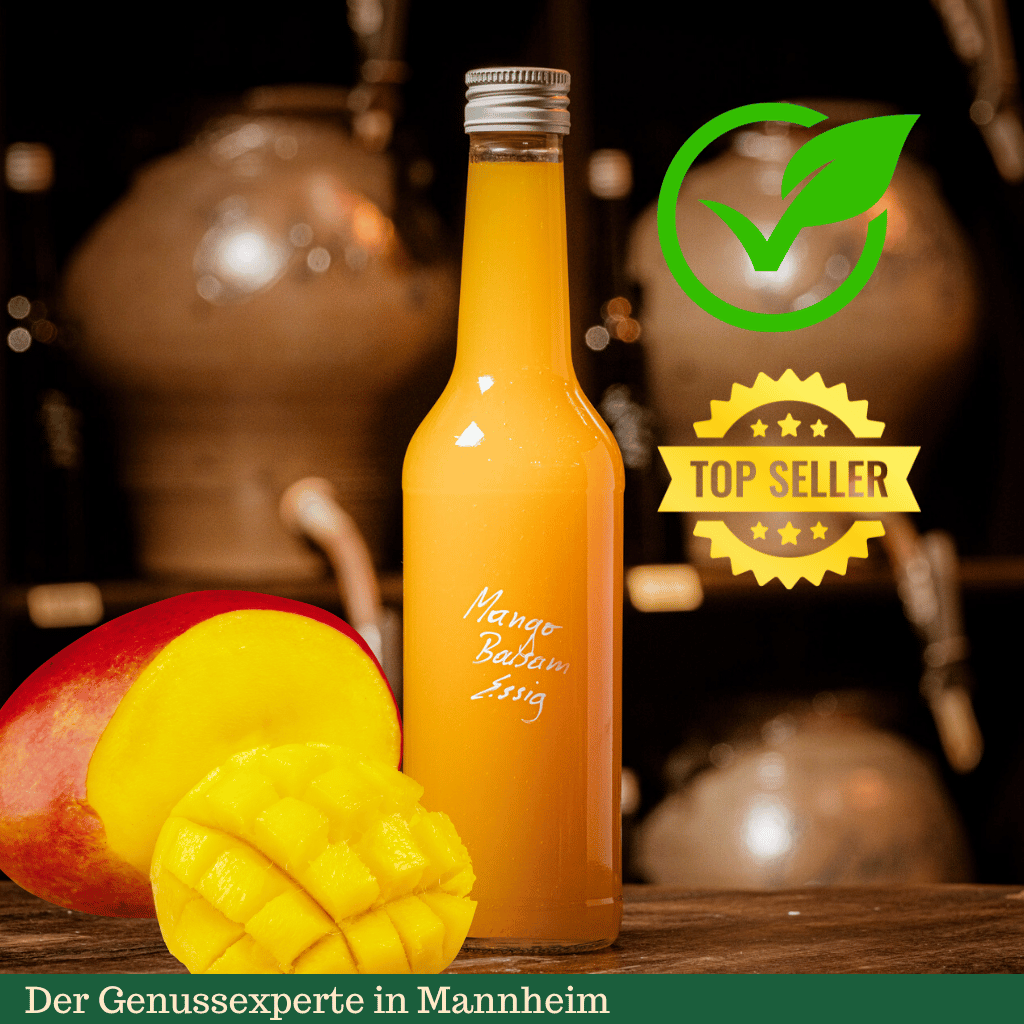 Eine Flasche gelber frischer Mangoessig mir Mango in Mannheim - vegan