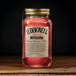 Laden Sie das Bild in den Galerie-Viewer, Ein Glas roter O&#39;Donnell Pfirsich Likör
